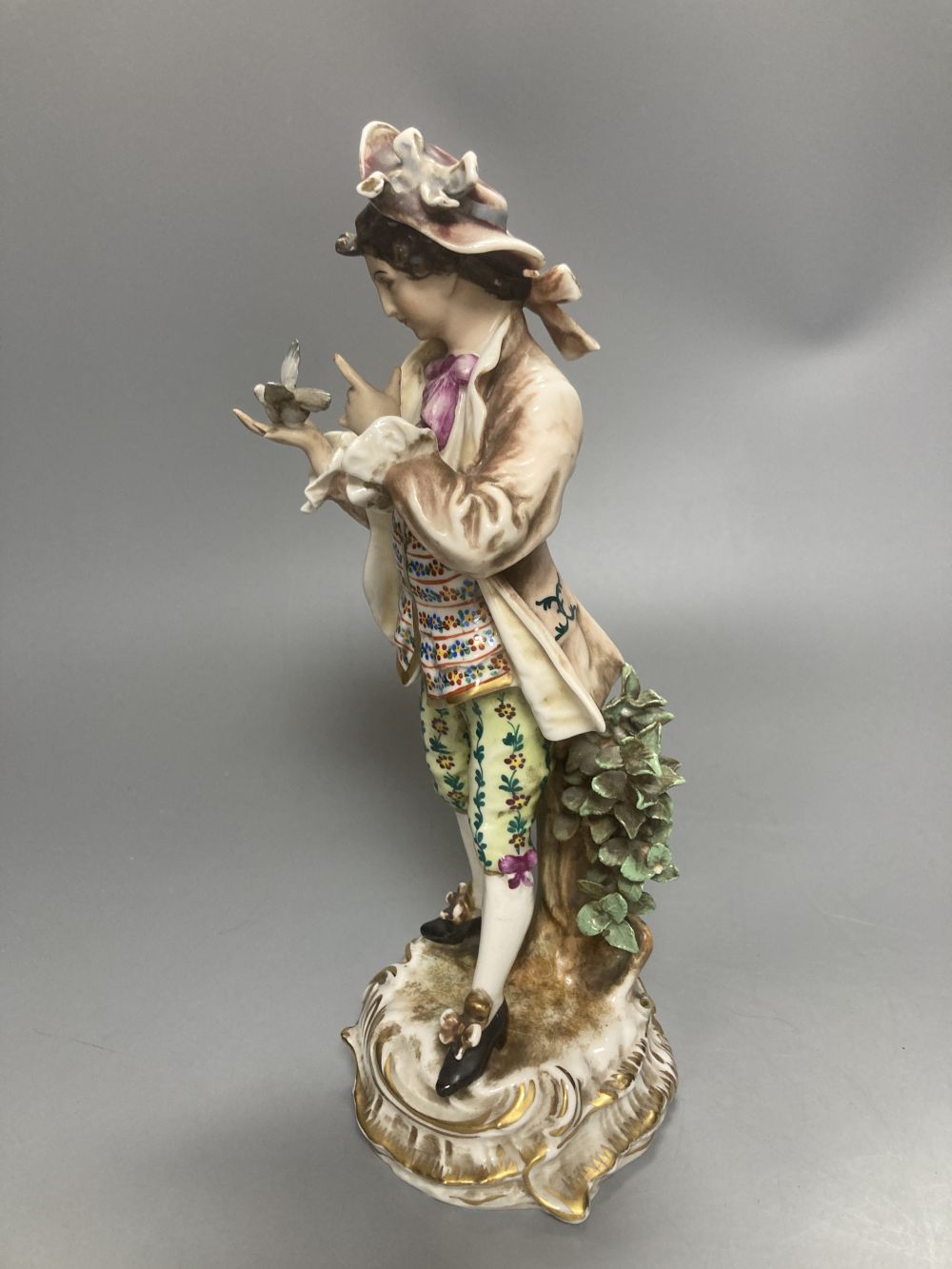 A pair of Wessel Frankenthal figures, 26cm, and a French bisque gallant, 29cm